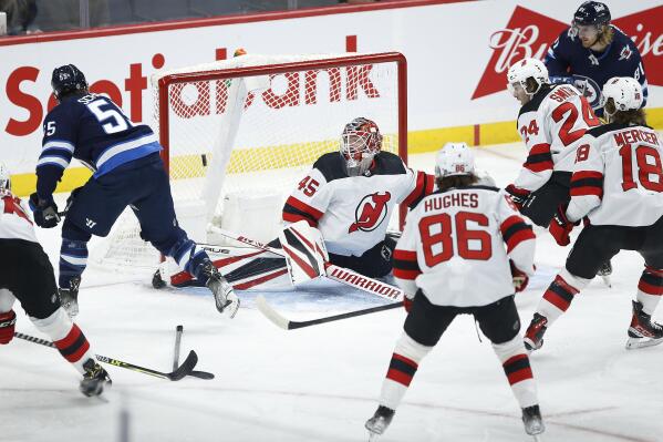 Jets Scheifele ends goal scoring drought with 3 vs. Devils AP News